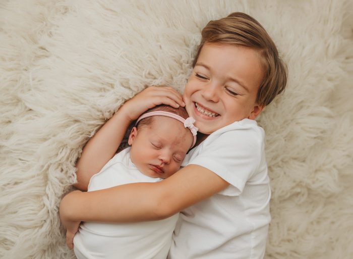newborn baby with big brother