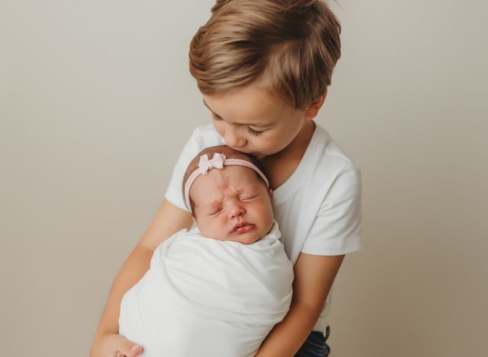 newborn sibling photos