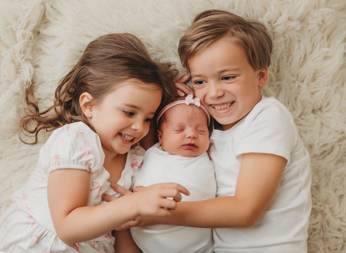 posed newborn photographer near me