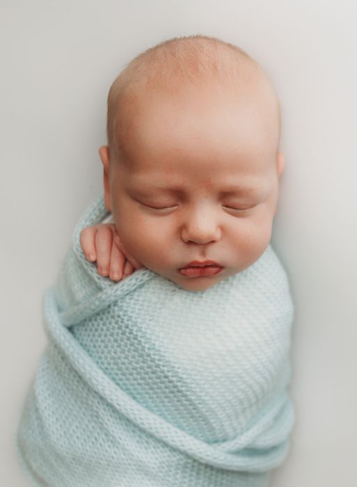 posed newborn photographer pdx