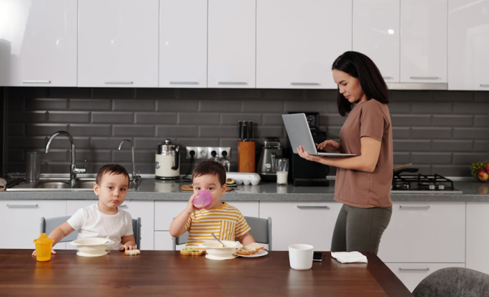 mom working from home with children