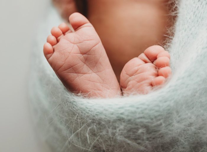 Calm in-home newborn photography of baby boy in Manhattan