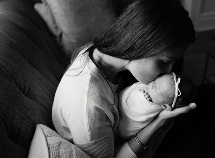 Relaxed newborn session photographed in a New York City home