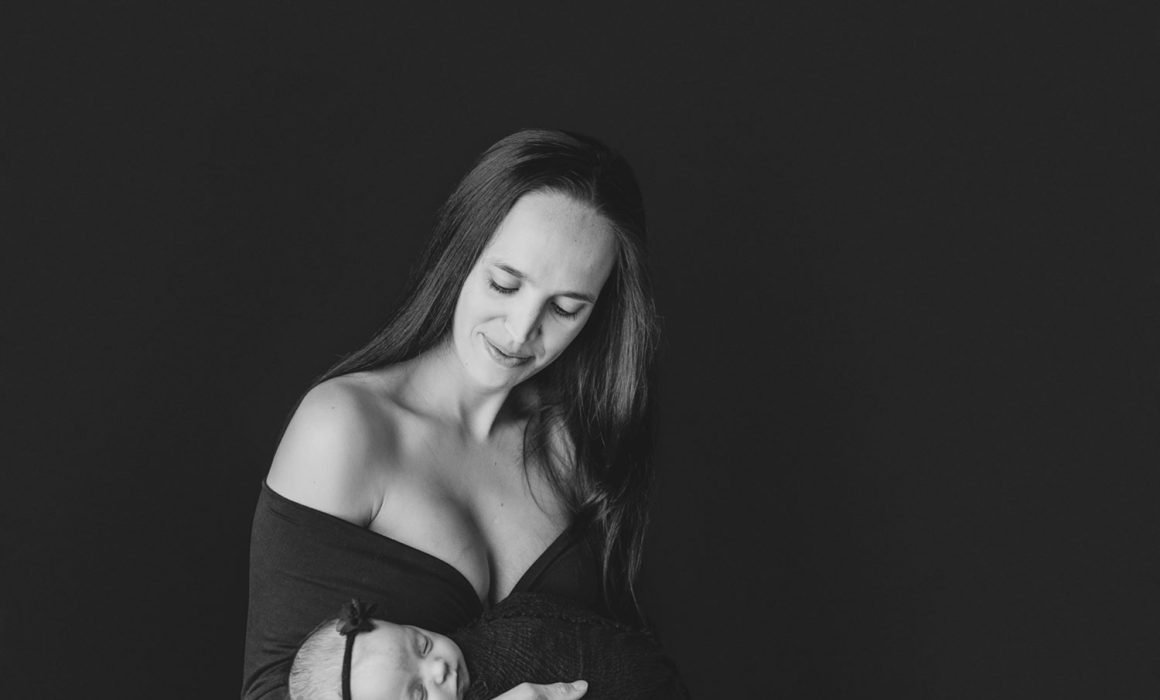 brand new baby girl and mom in a new york newborn photography