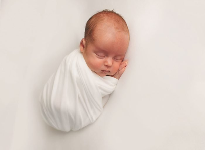 Elevated newborn photography experience offered in New York City