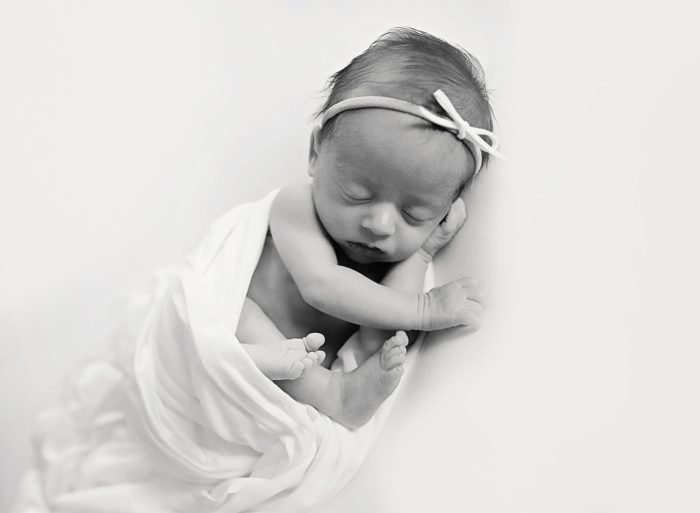 Soft light newborn photography session in a New York City home