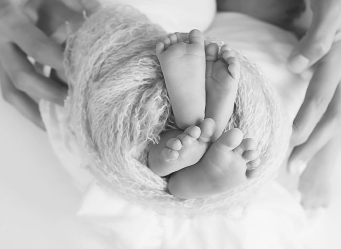 Modern newborn photography session in a New York City home