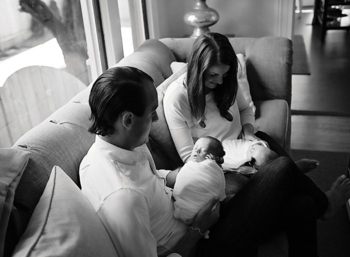Calm newborn photography session in New York City with parents and baby