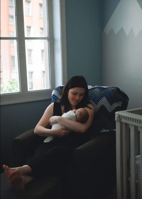 Natural light newborn photography in a NYC apartment living room