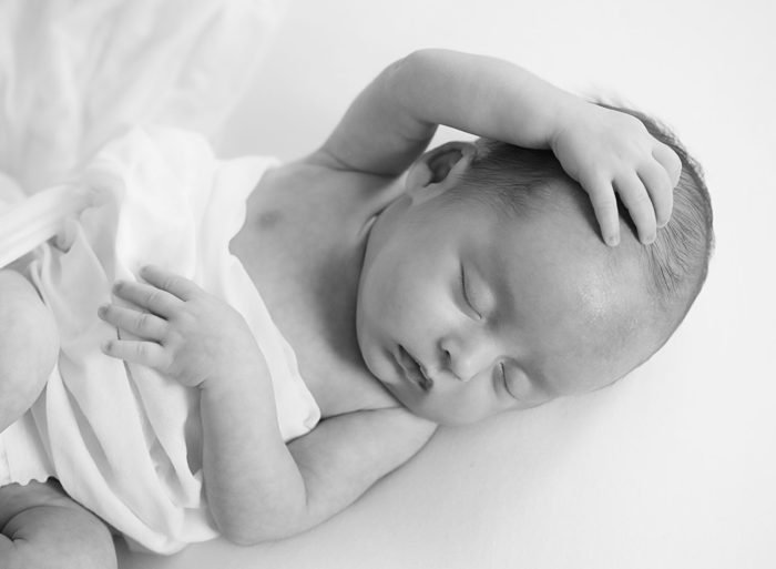 Lifestyle newborn photographer in New York City documenting early family moments