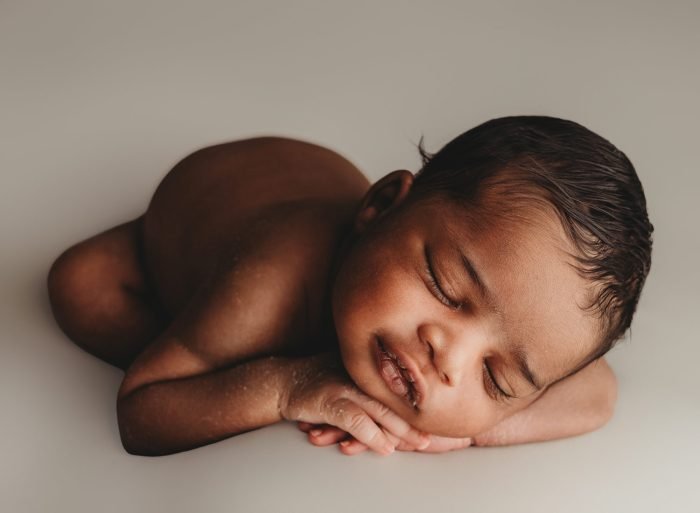 Soft, neutral newborn photography of baby boy in New York City
