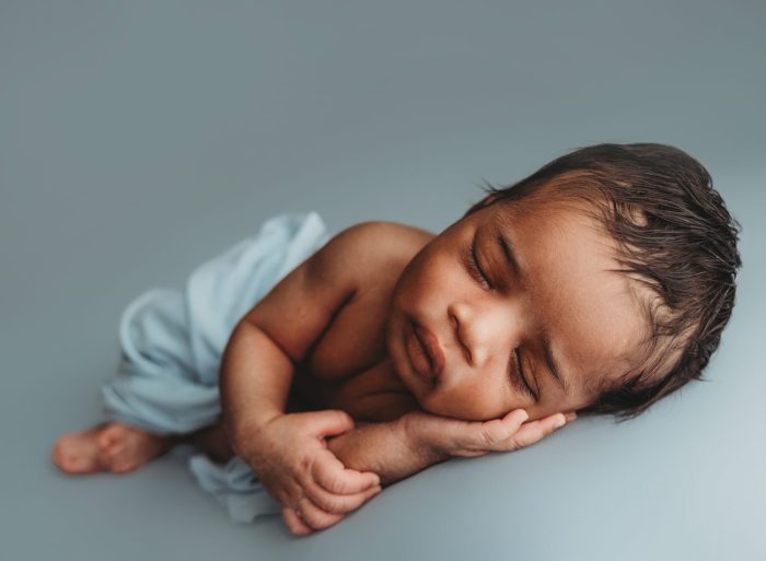 Soft, neutral newborn photography of baby boy in New York City