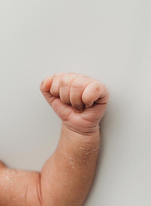 Natural light newborn photography of baby boy in NYC apartment