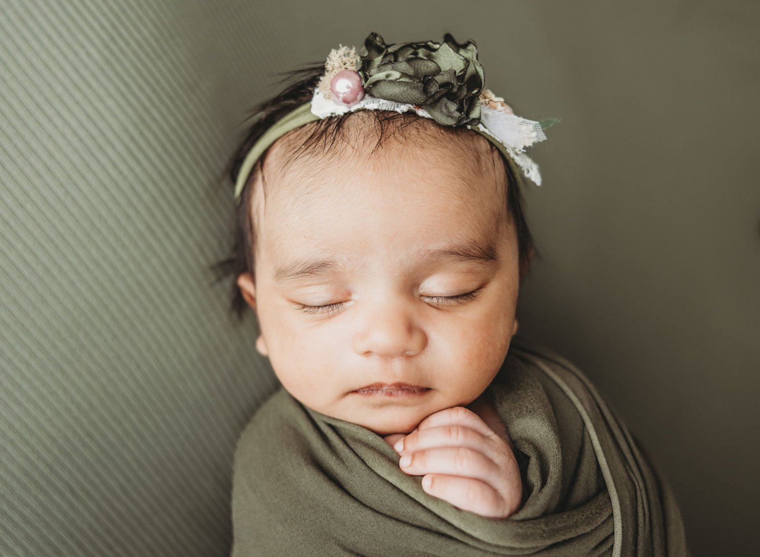 camas washington newborn photography baby girl in green flowers.
